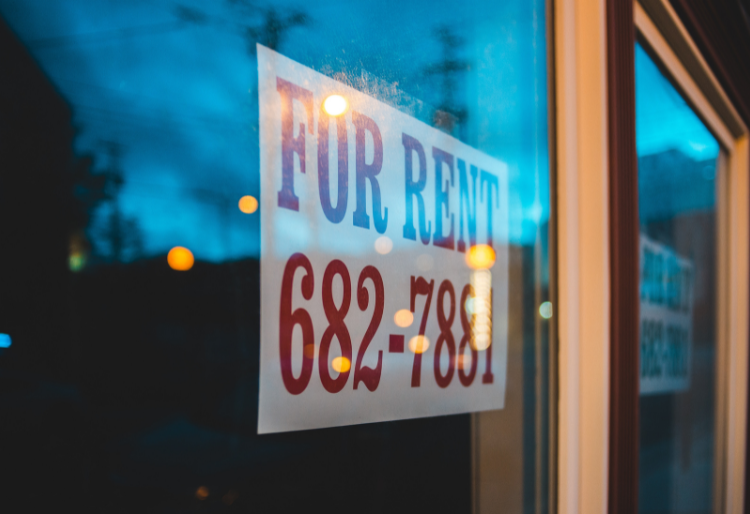 Photo of a rental sign in a window